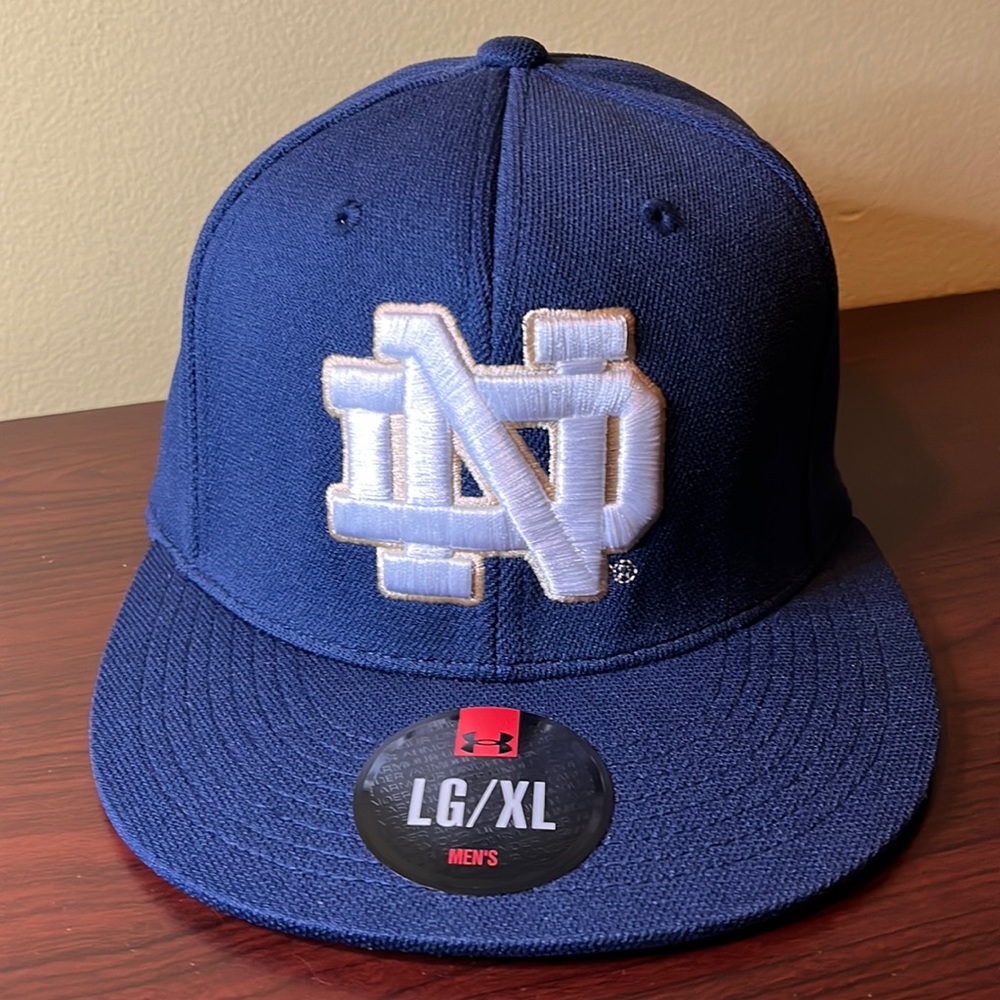 Notre Dame Under Armour 100% polyester ballcap. Men’s size Large/extra large.